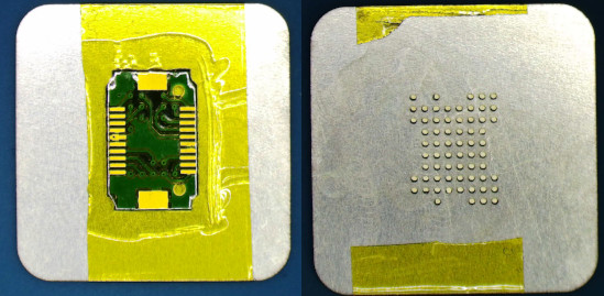 The PCB, duct-taped to the stencil